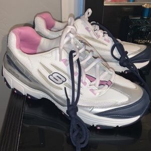 Pink and white sneakers